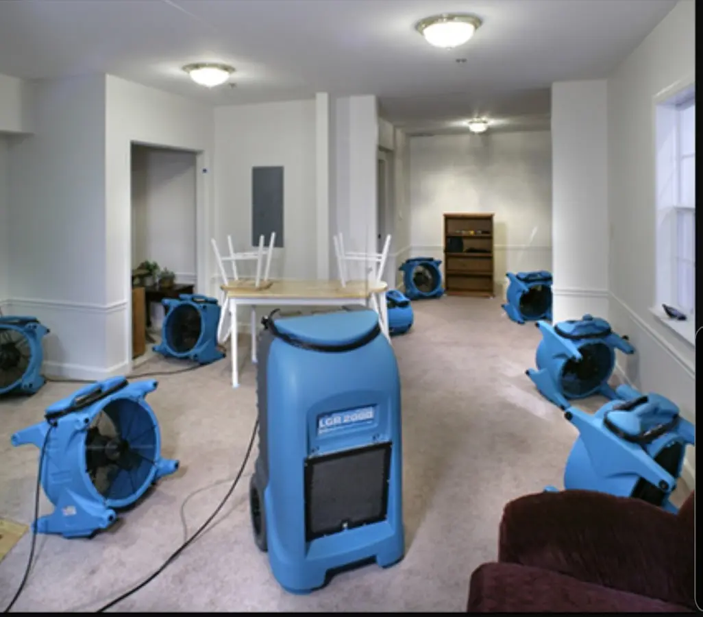 Air movers and dehumidifier setup for Water Damage Restoration in Woodfin